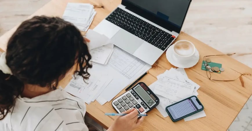 An Executive Assistant crunching numbers and budgeting for the upcoming fiscal year